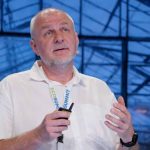 Nick Oseyko pitching at ECOSUMMIT